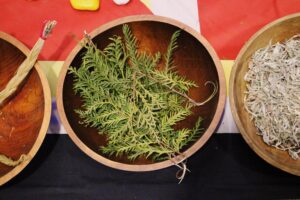 Foraged greens in a wooden bowl
