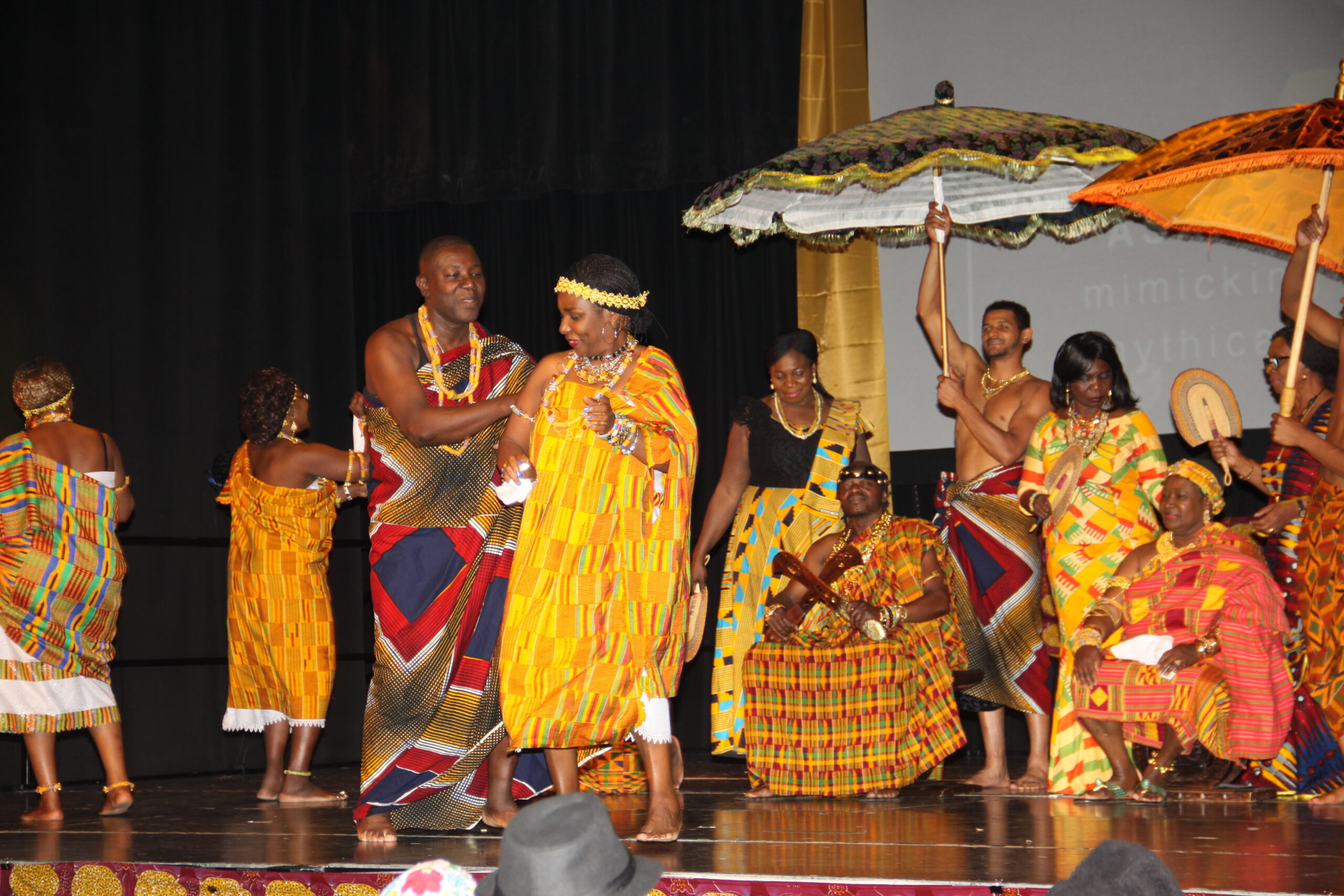 Ghanaian performers in traditional outfits