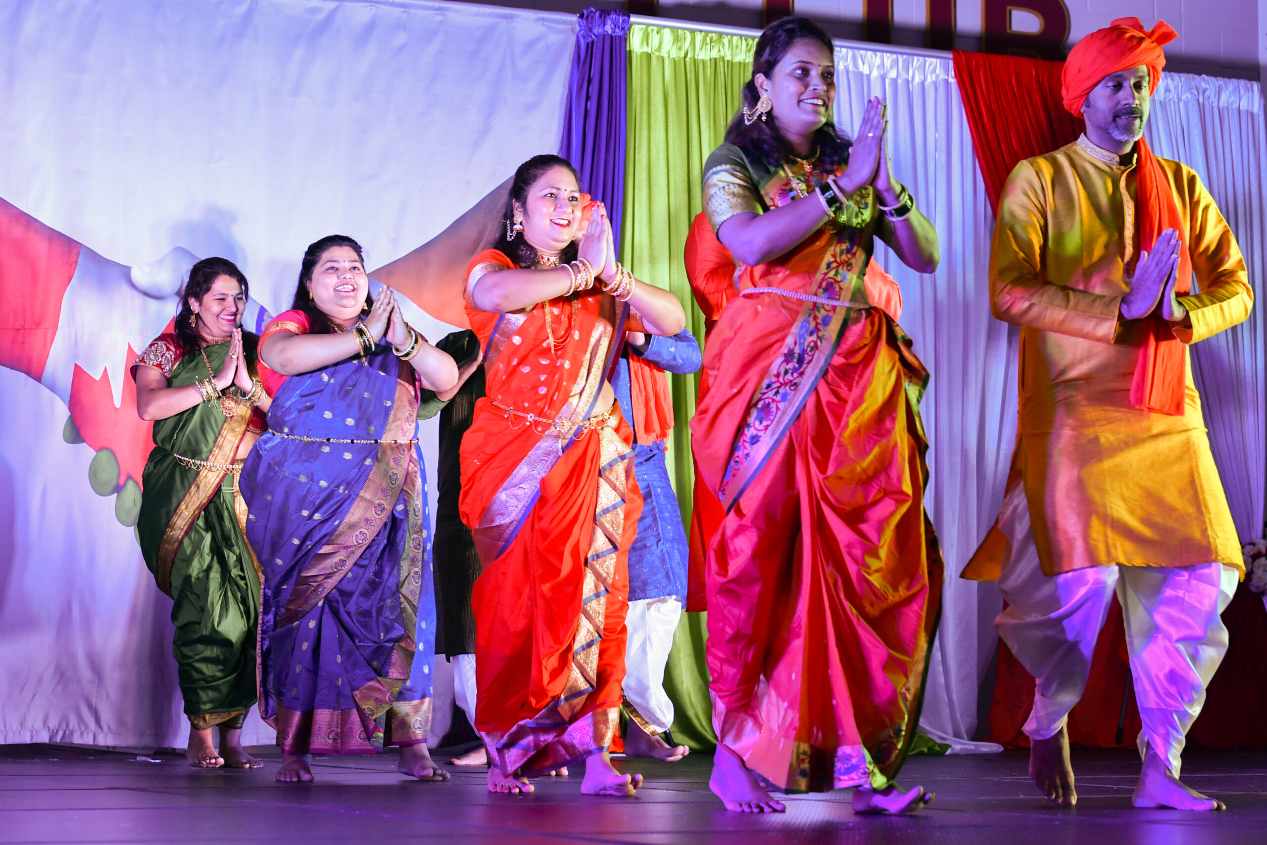 Indian performers in traditional outfits