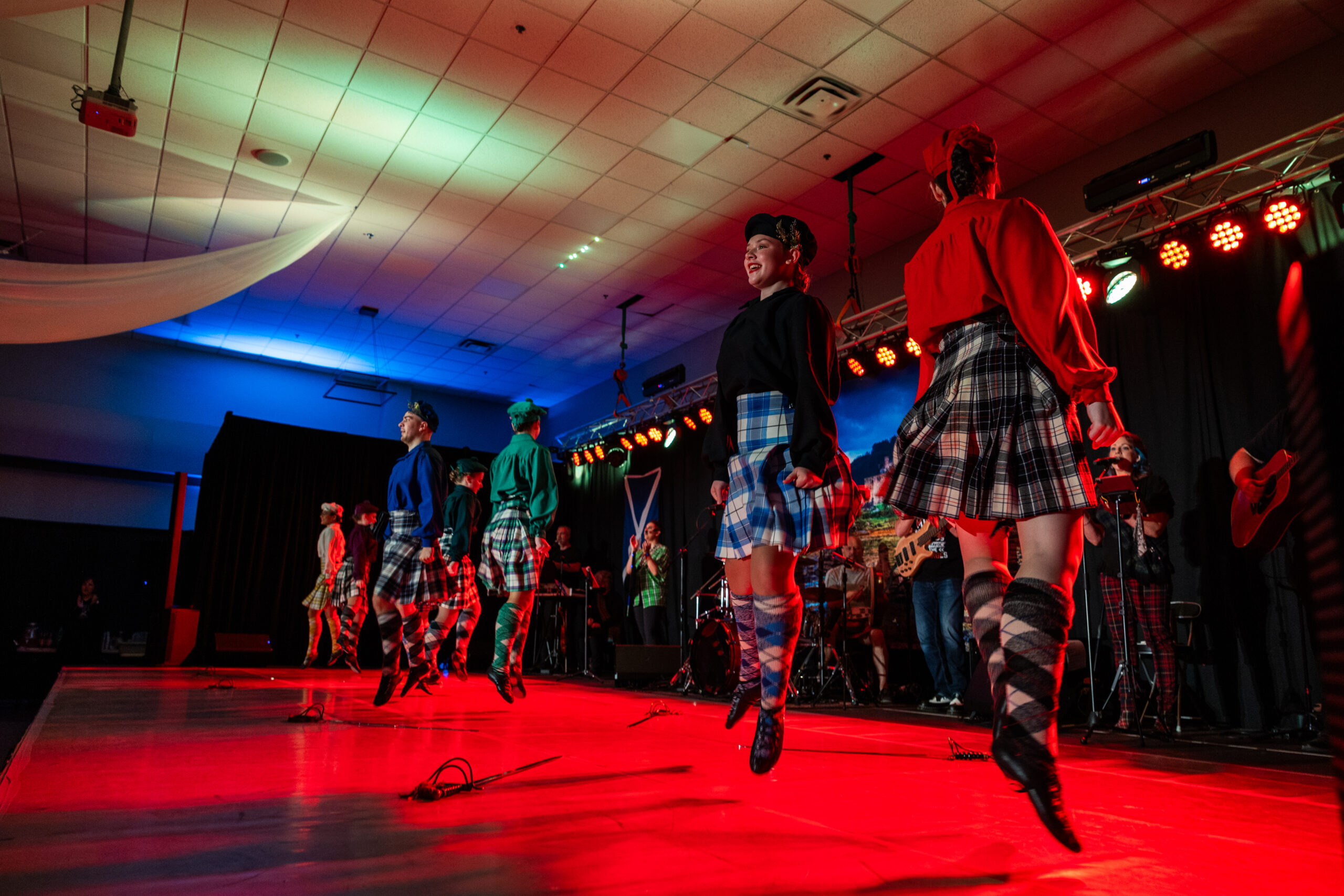 Scottish dancers performing in kilts