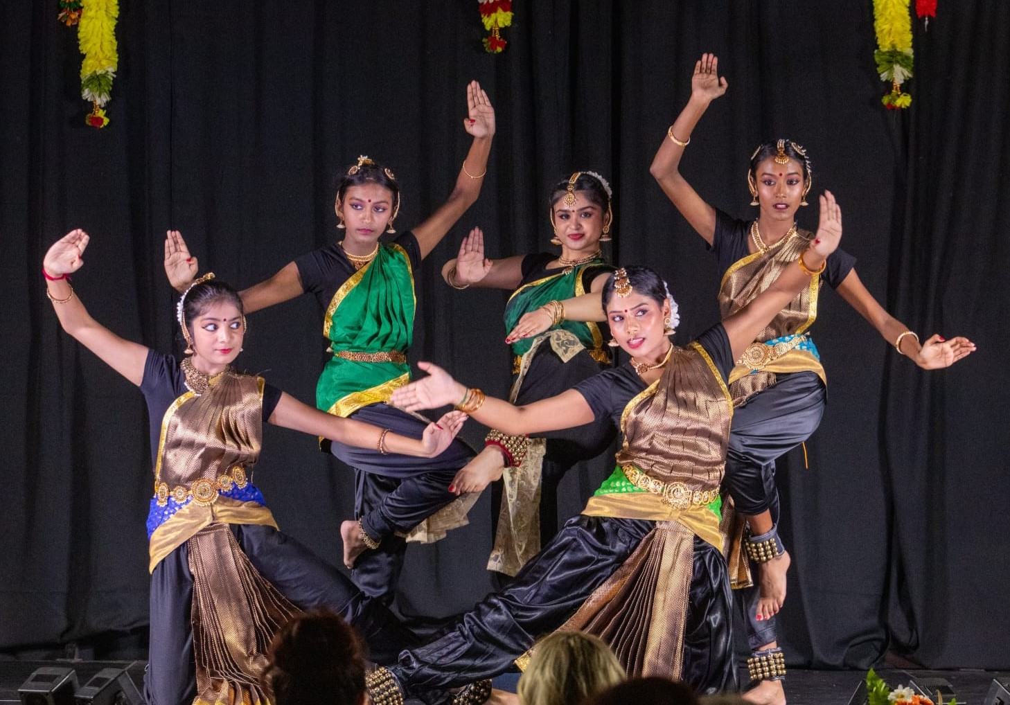 Tamil dancers performing on stage